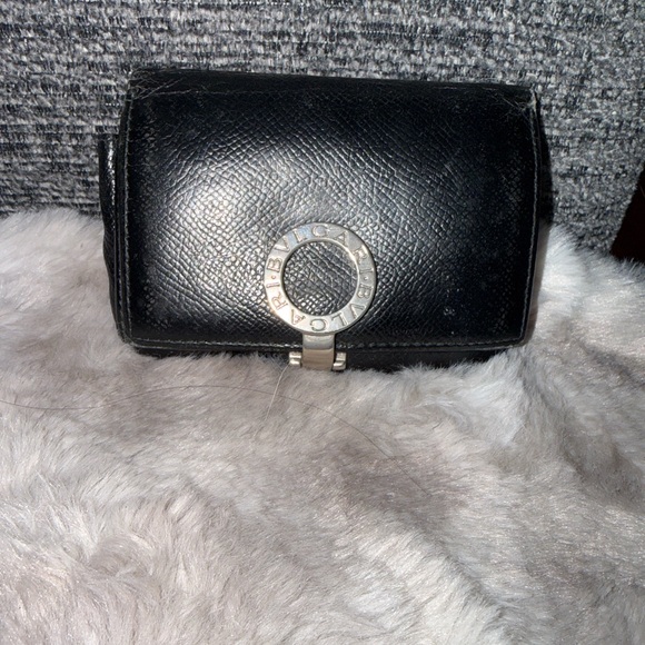 BVLGARI Handbags - Bulgari Black Leather Clutch with Silver Snap clip for front closure.